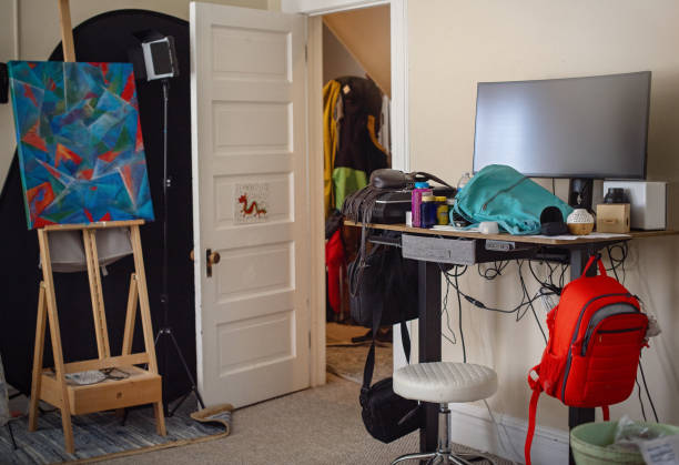 istock Packing frenzy disrupts artist's sanctuary. Creative space transformed into relocation battleground with scattered belongings. 2174165861