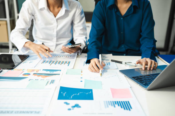 istock professional business meeting and discussing strategy with new startup project.Creative business people planning and brainstorm with document report 2174167544