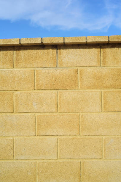 istock Yellow concrete blocks wall outdoors 2174168422