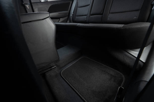 istock Clean car floor with black cloth mats 2174169166