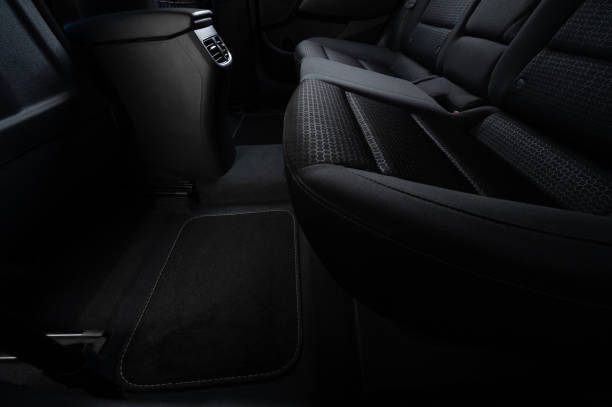 istock Clean car floor with fabric black mats 2174169203