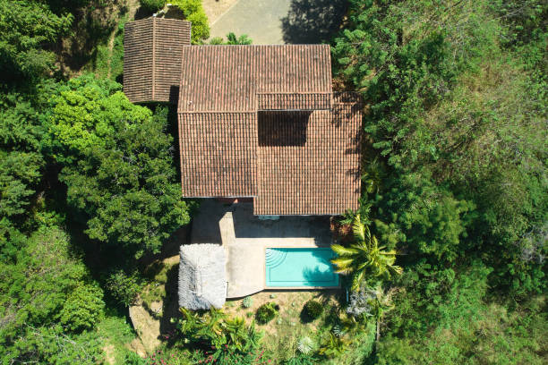 istock House with clay roof and swimming pool 2174169257