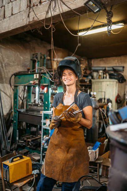 istock Young Female Welder In A Metal Workshop 2174170214