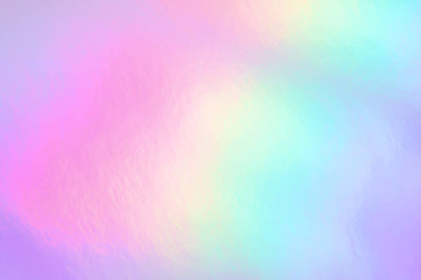 istock A shimmering iridescent foil background radiating soft pastel colors 2174170454