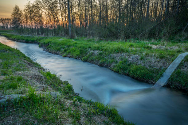Evening view of the small Uherka river, Stankow, Poland, long exposure