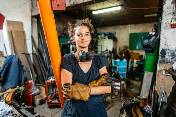 istock Young Female Welder In A Metal Workshop 2174170975