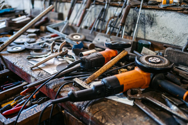 A variety of metalworking tools fill the busy workshop.