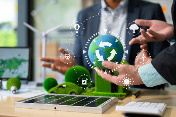 istock Holding a light bulb against nature on green leaf with energy source icon for renewable and sustainable development, ecology concept. 2174177144