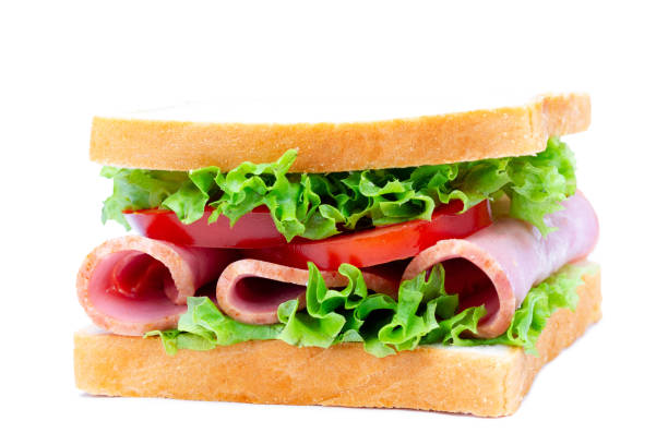 istock Isolated homemade fresh sandwich with ham and vegetables on white background 2174177788