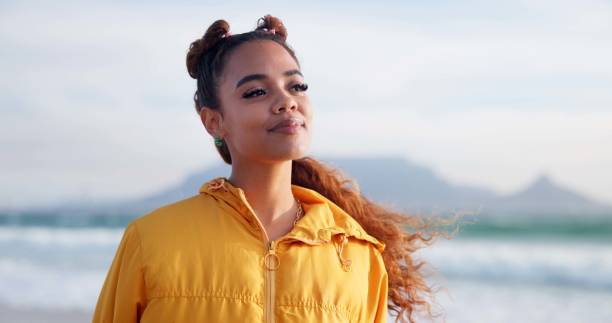 istock Woman, thinking and ocean for peace, reflection and location for inspiration in environment. Female person, remember memory and calm breeze on holiday at beach, weekend trip and travel to sea 2174178901