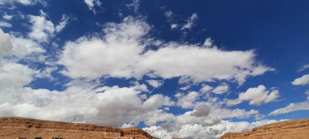 istock White Clouds Adorning a Blue Sky. 2174179653
