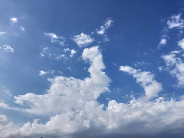 istock Moody white clouds visible at the blue sky 2174180294