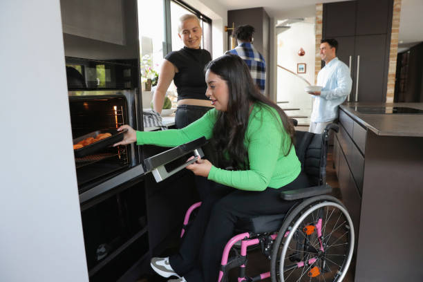 istock Friends preparing food in kitchen 2174185839
