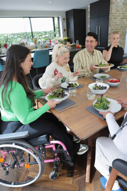 istock Friends eating lunch at home 2174186353