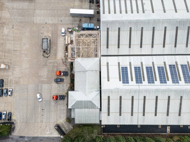 istock Drone view of a large distribution warehouse with a large frontage for lorries and trailers. 2174188030