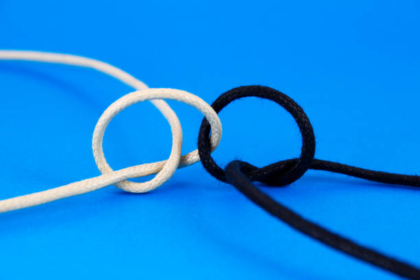 Black and white ropes tied together