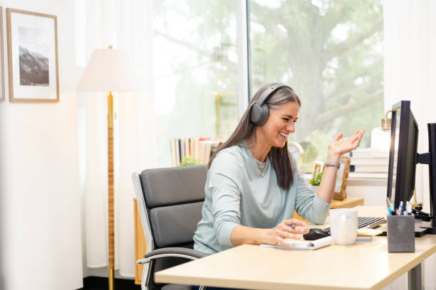 istock Businesswoman gestures while talking with her financial advisor 2174191869