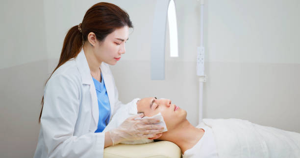 istock asian beautician skin clean client 2174191960