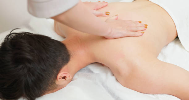 istock asian masseurs massage shoulder 2174192608