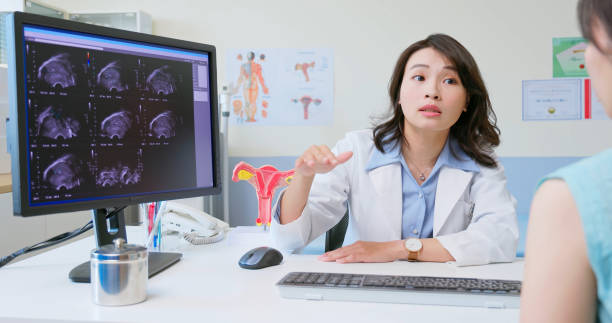 istock doctor explain woman Uterus ultrasound 2174193562