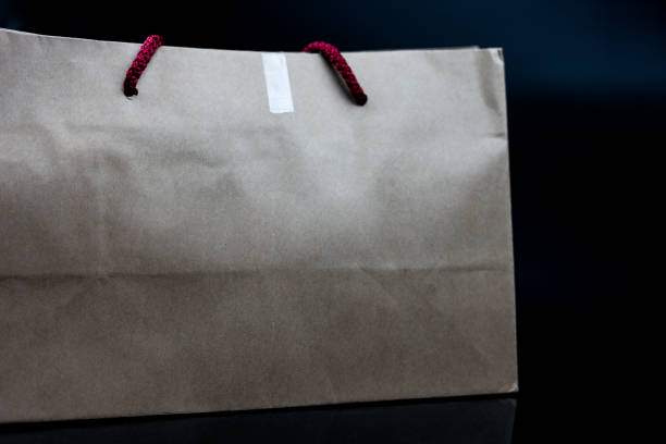 istock A brown paper shopping bag 2174193616