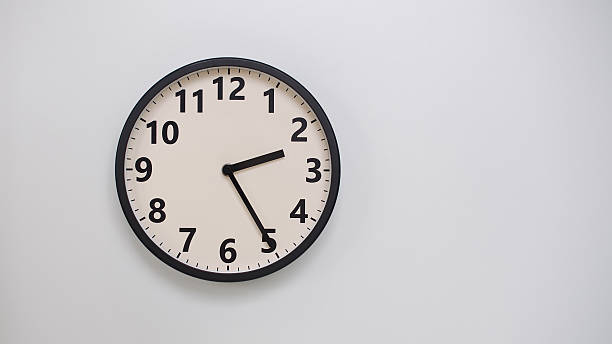 Classic Black-Edged Clock on White Background at 02.25 or 14.25 - Perfect for Time Management and Text Space
