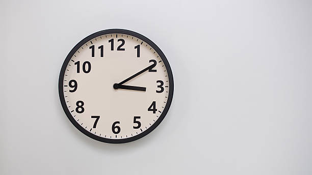 istock Classic Black-Edged Clock on White Background at 03.10 or 15.10 - Perfect for Time Management and Text Space 2174195625