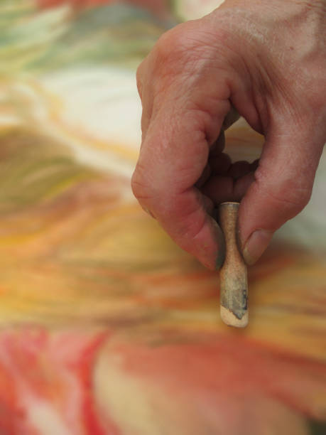 Pastel drawing  Human hand holding a pastel stick