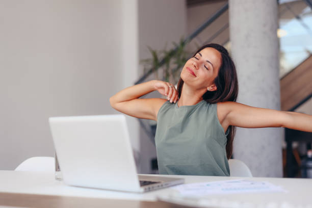 Relaxed Woman Enjoying A Peaceful Moment At Office