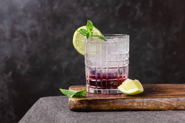 istock Cold cocktail lemon and mint in a glass 2174198233