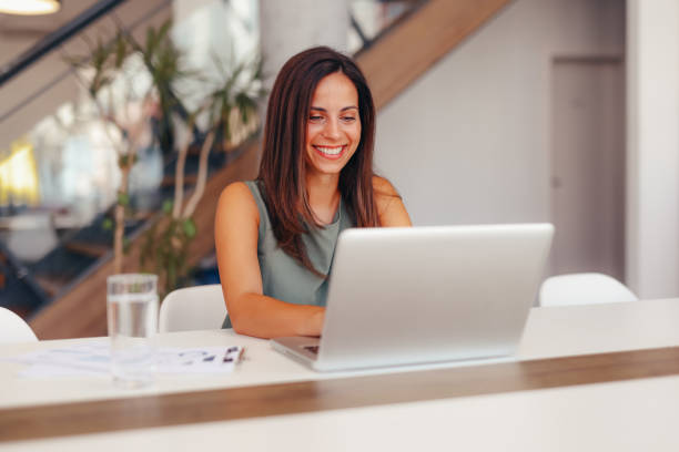 istock Successful businesswoman using laptop, working in office. Business technology corporate concept 2174199570