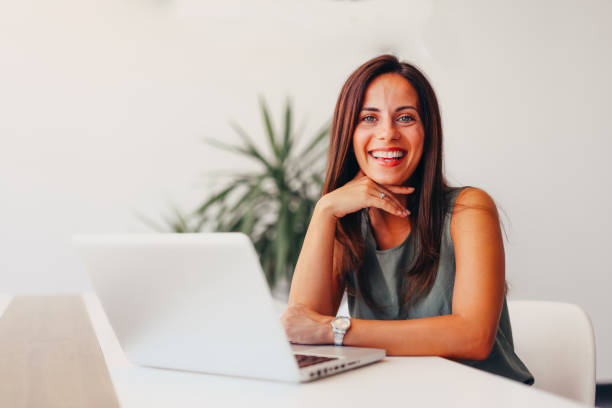 istock Successful businesswoman using laptop, working in office. Business technology corporate concept 2174199822