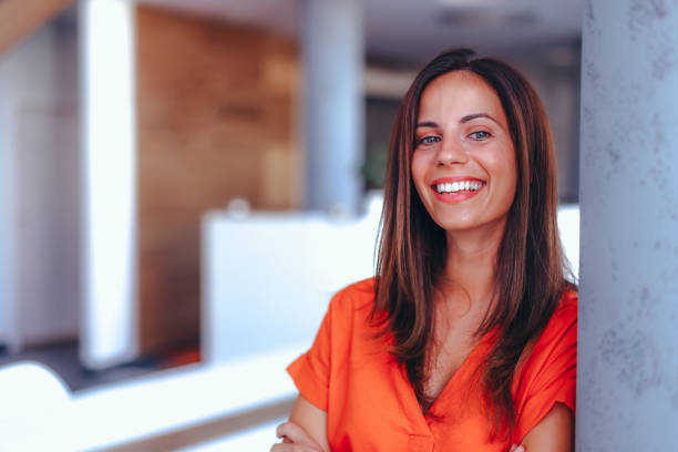 istock Smiling businesswoman posing in modern office 2174201409