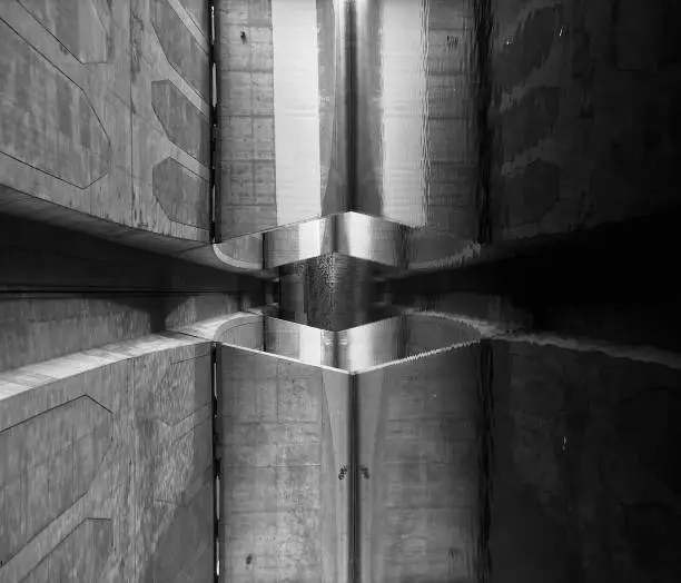 Photo of Abstract reflection under the bridge downtown.