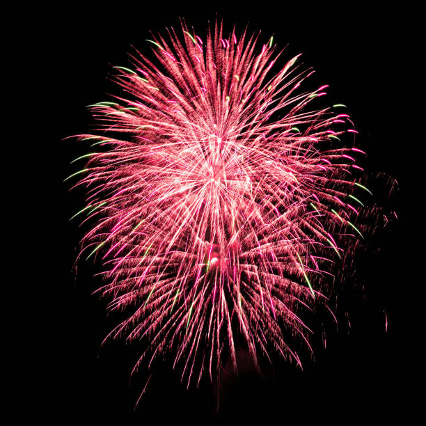 Colorful fireworks isolated on black sky background.