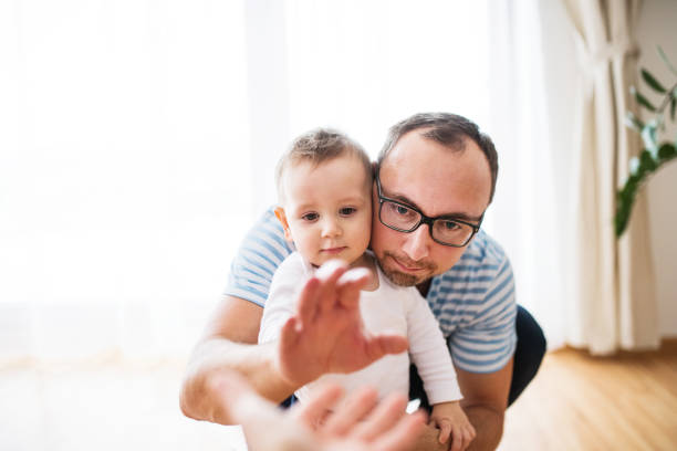 Portrait of father with little son