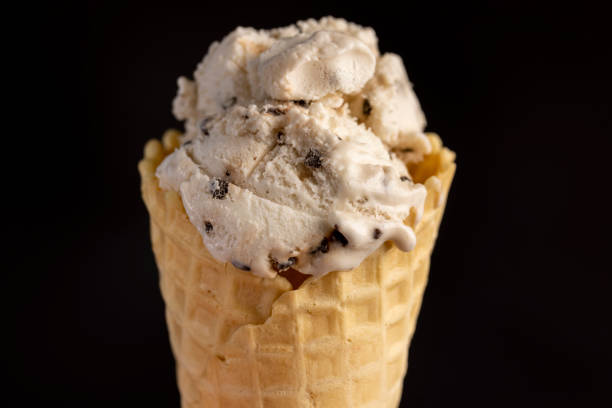 istock creamy ice cream with pieces of chocolate on a black slate 2174229664