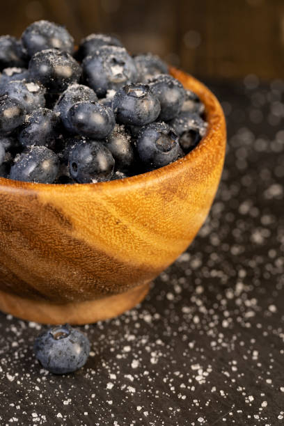 istock sprinkled with white sweet sugar juicy blueberry berries 2174229668