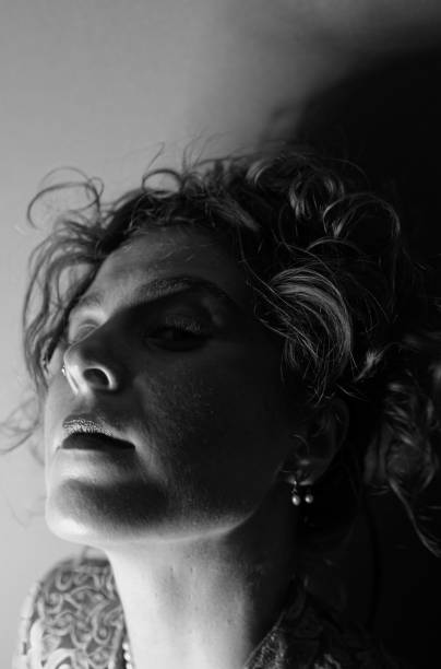 istock Woman in the dark. 2174231921