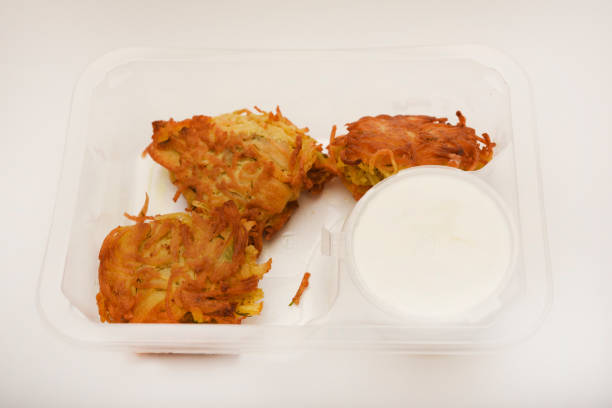 Fried potatoes in small pieces. Draniki. Delicious breakfast.