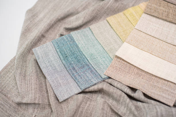 istock Melange fabric for curtains in pastel colors. Fabric samples for interior decoration and curtains. 2174236291