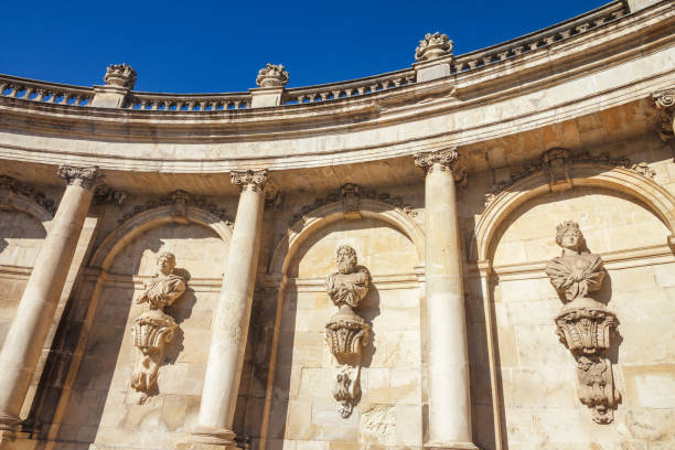 Nancy, France - September 25, 2023: Detail view of wall with statues in historic centre of town.