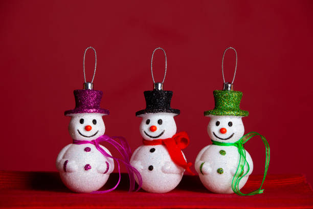 istock Snowman christmas decoration with red background 2174236934