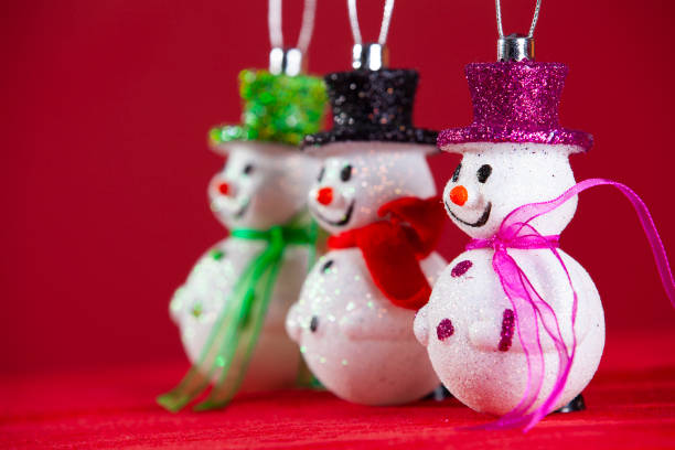 istock Snowman christmas decoration with red background 2174236953