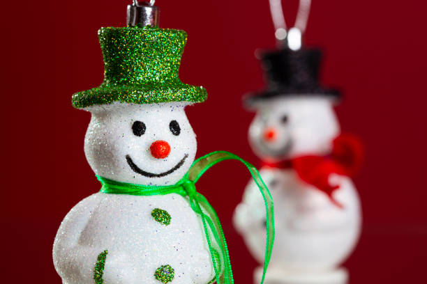 istock Snowman christmas decoration with red background 2174236961