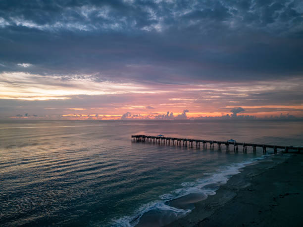 A colourful sunrise over Juno Beach, Florida, USA