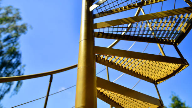 istock Winding spiral staircase outdoors. 2174249412