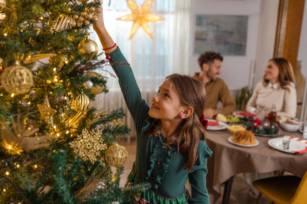 istock Family Christmas celebration with tree decorating 2174250718