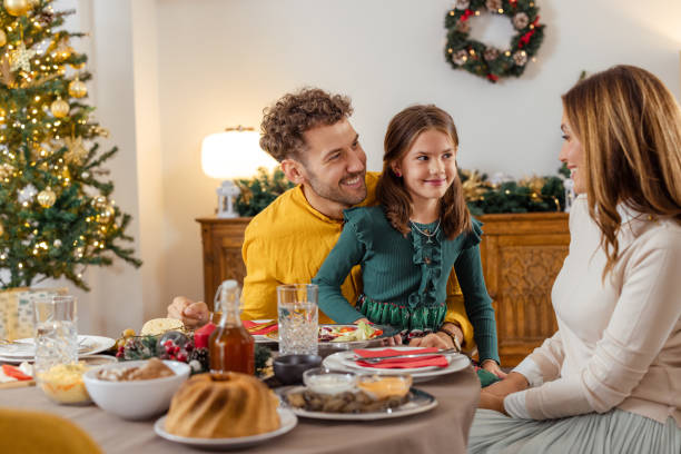 istock Young family having a wonderful Christmas time 2174250725