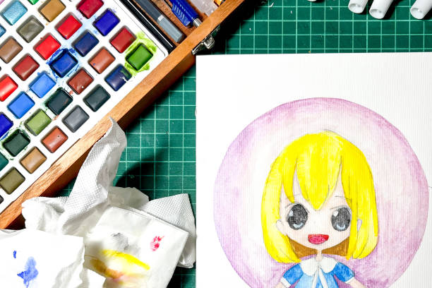 A completed colorful drawing of an anime character, with a paint palette and art supplies nearby. The vibrant colors and detailed illustration showcase the artist's skills and creativity.